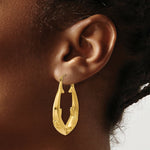 Load image into Gallery viewer, 14K Yellow Gold Polished Dolphin Hoop Earrings 21mm length