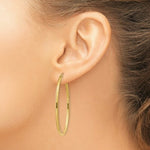 Load image into Gallery viewer, 14K Yellow Gold Oval Polished Hoop Earring 28mm length