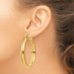 Load image into Gallery viewer, 14K Yellow Gold Round Tube Hoop Earrings 26mm length