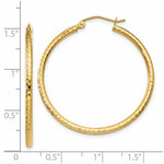 Load image into Gallery viewer, 14K Yellow Gold Diamond-cut 2mm Round Tube Hoop Earrings 35mm length