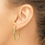 Load image into Gallery viewer, 14K Yellow Gold Diamond-cut 2mm Round Tube Hoop Earrings 30mm length