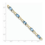Load image into Gallery viewer, 14K Yellow Gold 7x5mm Oval Blue Topaz Bracelet