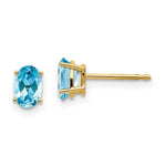 Load image into Gallery viewer, 14K Yellow Gold 6x4 Oval December Blue Topaz Post Earrings 1.14-Carat tw