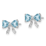 Load image into Gallery viewer, 14k White Gold Polished Light Swiss Blue Topaz Bow Post Earrings