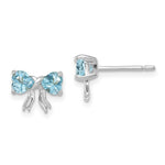 Load image into Gallery viewer, 14k White Gold Polished Light Swiss Blue Topaz Bow Post Earrings