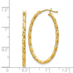 Load image into Gallery viewer, 14K Yellow Gold Textured Oval Hoop Earrings  15mm length
