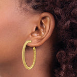 Load image into Gallery viewer, 14K Yellow Gold 4x35mm Twisted Round Omega Back Hoop Earrings
