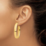 Load image into Gallery viewer, 14K Yellow Gold High Polished 7mm Omega Back Oval Hoop Earrings
