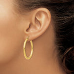 Load image into Gallery viewer, 14K Yellow Gold 3mm Light Tube Hoop Earrings  35mm length
