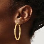 Load image into Gallery viewer, 14K Yellow Gold 3mm Light Tube Hoop Earrings  40mm length
