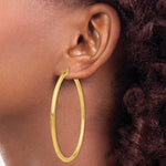 Load image into Gallery viewer, 14K Yellow Gold 3mm Light Tube Hoop Earrings  65mm length
