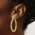Load image into Gallery viewer, 14K Yellow Gold Polished 4mm x 40mm Tube Hoop Earrings  40mm length
