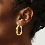 Load image into Gallery viewer, 14K Yellow Gold Polished 4mm x 30mm Tube Hoop Earrings  30mm length
