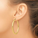 Load image into Gallery viewer, 14K Yellow Gold Polished 4mm Lightweight Round Hoop Earrings 50mm length

