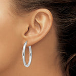 Load image into Gallery viewer, 14K White Gold Polished 3.5mm Oval Tube Hoop Earrings  22mm length
