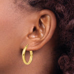 Load image into Gallery viewer, 14K Yellow Gold Round Tube Hoop Earrings 21mm length
