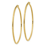 Load image into Gallery viewer, 14K Yellow Gold Diamond-cut 2mm Round Tube Hoop Earrings  60mm length
