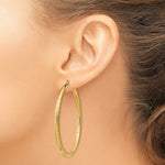 Load image into Gallery viewer, 14K Yellow Gold Satin &amp; Diamond-cut 3mm Round Hoop Earrings 55mm length
