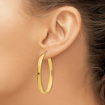 Load image into Gallery viewer, 14K Yellow Gold Lightweight Oval Hoop Earrings  29mm length
