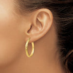 Load image into Gallery viewer, 14K Yellow Gold Diamond-cut 3.5x28mm Hollow Hoop Earrings  28mm length
