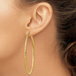 Load image into Gallery viewer, 14K Yellow Gold Knife Edge Diamond-cut Hollow Hoop Earrings  65mm length

