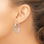 Load image into Gallery viewer, 14K White Gold Polished 3.75mm Oval Tube Hoop Earrings  17mm length
