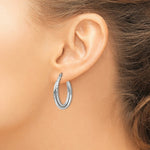Load image into Gallery viewer, 14K White Gold Diamond-cut Polished Oval Hoop Earring 17mm length

