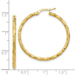 Load image into Gallery viewer, 14K Yellow Gold Polished and Textured Hoop Earrings 35mm length
