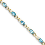 Load image into Gallery viewer, 14K Yellow Gold 7x5mm Oval Blue Topaz Bracelet
