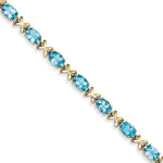 Load image into Gallery viewer, 14K Yellow Gold 7x5mm Oval Blue Topaz Bracelet

