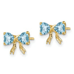Load image into Gallery viewer, 14k Yellow Gold Polished Light Swiss Blue Topaz Bow Post Earrings
