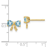 Load image into Gallery viewer, 14k Yellow Gold Polished Light Swiss Blue Topaz Bow Post Earrings
