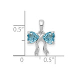 Load image into Gallery viewer, 14k White Gold Polished Light Swiss Blue Topaz Bow Pendant
