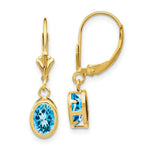 Load image into Gallery viewer, 14K Yellow Gold 7x5mm Oval Blue Topaz Leverback Earrings
